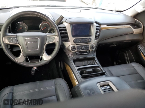 2016 GMC Yukon Denali with VIN 1GKS2CKJ1GR354386, listed as a Copart auction lot 80504333 with 118,258 mi miles and Salvage Title. Bid and sale history available at carsss.com. Image 8.