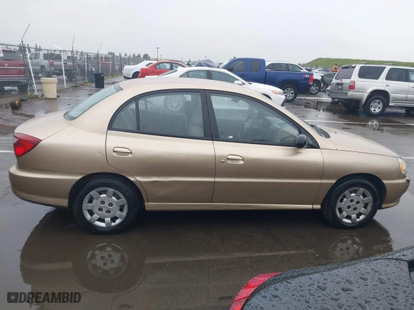 2002 Kia Rio with VIN KNADC123626192611, listed as a IAAI auction lot 41765104 with 62,387 mi miles. Bid and sale history available at carsss.com. Image 13.
