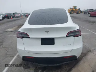2022 Tesla Model Y Long Range z VIN 7SAYGDEE4NF315356, wystawiony jako IAAI lot #41571151 z przebiegiem 1 056 mil mil oraz . Historia ofert i sprzedaży dostępna na DreamBid. Obrazek 16.