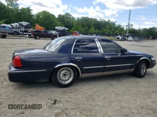 1999 Mercury Grand Marquis LS с VIN 2MEFM75W2XX683074, выставлен на аукционе Copart как лот 55679225 с пробегом 198 956 миль миль и Списание • Salvage title. История ставок и продаж доступна на DreamBid. Изображение 3.