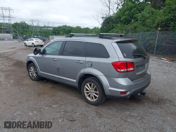 2017 Dodge Journey SXT with VIN 3C4PDDBG8HT577782, listed as a IAAI auction lot 42409731 with 136,618 mi miles and . Bid and sale history available at DreamBid. Image 3.