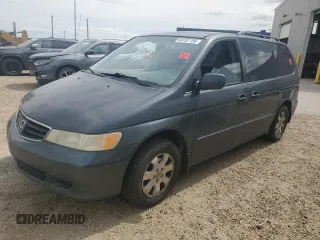 2003 Honda Odyssey EX with VIN 2HKRL18603H013853, listed as a Copart auction lot 64787785 with Not provided miles and Salvage title. Bid and sale history available at DreamBid. Image 1.