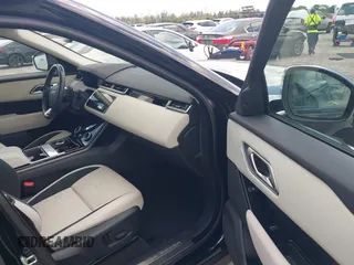 2019 Land Rover Range Rover Velar S z VIN SALYB2EX7KA210115, wystawiony jako IAAI lot #42074813 z przebiegiem 34 647 mil mil oraz . Historia ofert i sprzedaży dostępna na DreamBid. Obrazek 5.