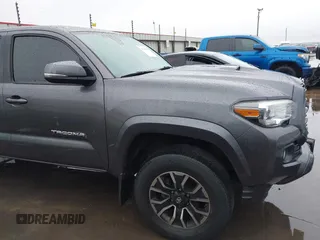 2020 Toyota Tacoma SR5 with VIN 5TFCZ5AN1LX227753, listed as a IAAI auction lot 41543939 with 35,860 mi miles and . Bid and sale history available at DreamBid. Image 18.