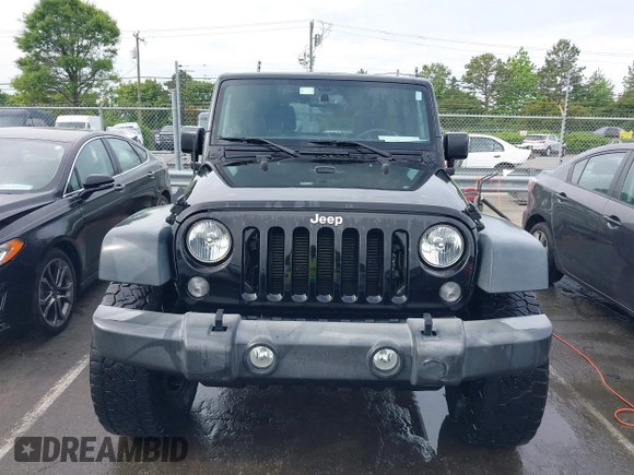 2015 Jeep Wrangler Unlimited Willys Wheeler with VIN 1C4BJWDG4FL687829, listed as a IAAI auction lot 42099147 with 98,969 mi miles and . Bid and sale history available at DreamBid. Image 13.