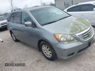 2008 Honda Odyssey EX-L with VIN 5FNRL38748B045957, listed as a IAAI auction lot 41885593 with 212,799 mi miles. Bid and sale history available at carsss.com. Image 1.