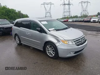 2011 Honda Odyssey Touring с VIN 5FNRL5H95BB094816, выставлен на аукционе IAAI как лот 42366094 с пробегом 82 054 миль миль и . История ставок и продаж доступна на DreamBid. Изображение 1.