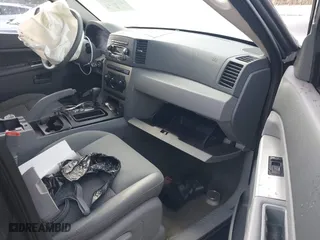 2005 Jeep Grand Cherokee Laredo with VIN 1J4GS48K85C709829, listed as a IAAI auction lot 41200259 with 1 mi miles. Bid and sale history available at carsss.com. Image 5.