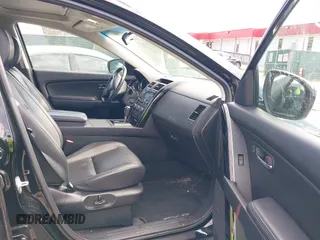 2012 Mazda CX-9 Touring z VIN JM3TB3CV6C0369022, wystawiony jako IAAI lot #41895225 z przebiegiem 137 883 mil mil oraz . Historia ofert i sprzedaży dostępna na DreamBid. Obrazek 5.