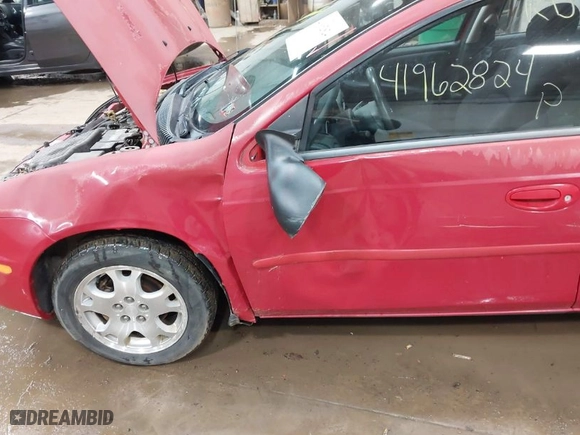 2003 Dodge Neon SXT with VIN 1B3ES56C03D189956, listed as a IAAI auction lot 41962824 with 51,872 mi miles. Bid and sale history available at carsss.com. Image 6.