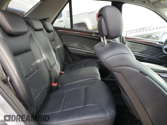2010 Mercedes-Benz M 350 with VIN 4JGBB2FB5AA618770, listed as a Copart auction lot 79542974 with 141,733 mi miles and Salvage Title. Bid and sale history available at DreamBid. Image 11.