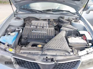 2002 Mitsubishi Diamante z VIN 6MMAP87P72T013353, wystawiony jako IAAI lot #42070862 z przebiegiem 169 400 mil mil oraz . Historia ofert i sprzedaży dostępna na DreamBid. Obrazek 10.