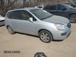 2007 Kia Rondo LX Base with VIN KNAFG525277063983, listed as a IAAI auction lot 41810864 with 112,981 mi miles. Bid and sale history available at carsss.com. Image 1.