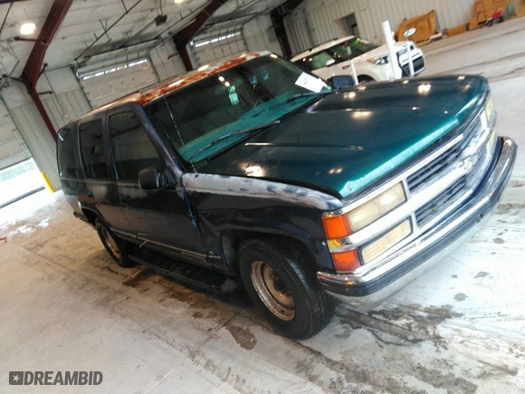 1999 Chevrolet Tahoe with VIN 1GNEC13R9XJ536325, listed as a IAAI auction lot 41475643 with 206,804 mi miles. Bid and sale history available at carsss.com. Image 1.