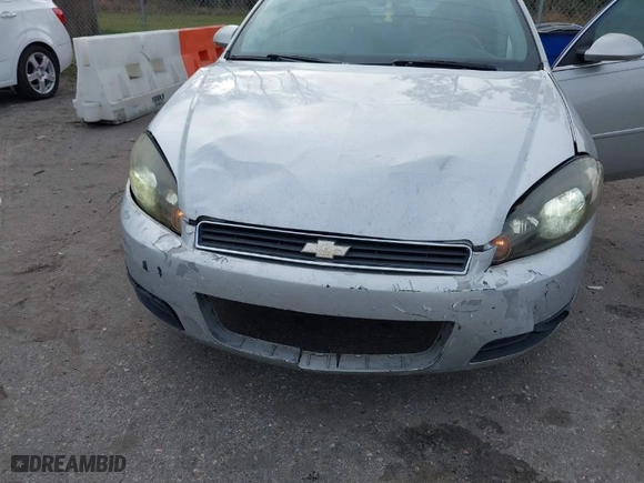 2008 Chevrolet Impala LT with VIN 2G1WT58K281255617, listed as a IAAI auction lot 41683476 with 243,927 mi miles. Bid and sale history available at carsss.com. Image 6.