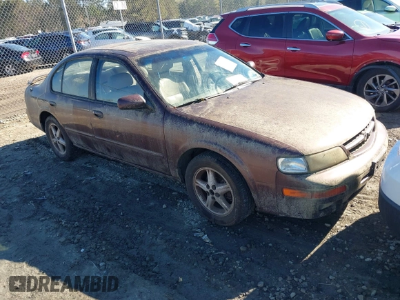 1998 Nissan Maxima GXE z VIN JN1CA21A0WT402950, wystawiony jako IAAI lot #41825084 z przebiegiem 244 042 mil mil oraz . Historia ofert i sprzedaży dostępna na DreamBid. Obrazek 1.