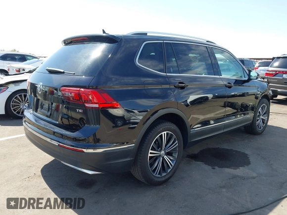 2018 Volkswagen Tiguan SEL with VIN 3VV3B7AX4JM056650, listed as a IAAI auction lot 42394948 with 35,696 mi miles and . Bid and sale history available at DreamBid. Image 4.