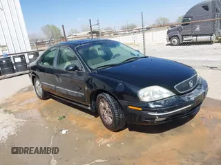 2000 Mercury Sable LS Premium with VIN 1MEFM55SXYA645345, listed as a IAAI auction lot 41778827 with 196,746 mi miles. Bid and sale history available at carsss.com. Image 1.