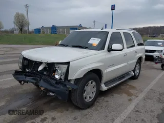 2005 Cadillac Escalade z VIN 1GYEK63N25R190908, wystawiony jako IAAI lot #41882135 z przebiegiem 243 333 mil mil oraz . Historia ofert i sprzedaży dostępna na DreamBid. Obrazek 18.