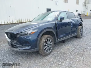 2018 Mazda CX-5 Grand Touring with VIN JM3KFBDM5J0313103, listed as a IAAI auction lot 35896676 with 43,918 mi miles. Bid and sale history available at carsss.com. Image 2.