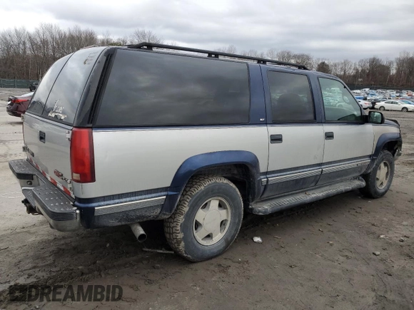 1997 GMC Suburban z VIN 1GKFK16R3VJ761305, wystawiony jako Copart lot #85785574 z przebiegiem 269 721 mil mil oraz Szkoda całkowita • Salvage title. Historia ofert i sprzedaży dostępna na DreamBid. Obrazek 3.