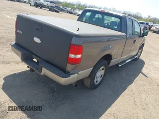 2007 Ford F-150 STX with VIN 1FTRX12W57FB45746, listed as a IAAI auction lot 41786902 with 242,405 mi miles and . Bid and sale history available at DreamBid. Image 4.