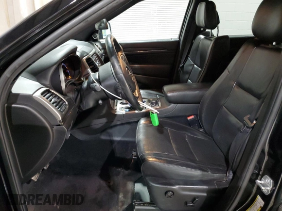 2018 Jeep Grand Cherokee Overland with VIN 1C4RJFCG1JC287784, listed as a Copart auction lot 50391255 with 105,981 mi miles and Salvage title. Bid and sale history available at DreamBid. Image 7.