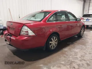 2009 Ford Taurus SEL with VIN 1FAHP24W89G123452, listed as a IAAI auction lot 41335622 with 229,182 mi miles. Bid and sale history available at carsss.com. Image 4.