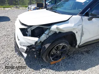 2021 Toyota RAV4 Hybrid XSE with VIN 4T3E6RFV9MU040817, listed as a IAAI auction lot 42182773 with 39,438 mi miles and . Bid and sale history available at DreamBid. Image 6.