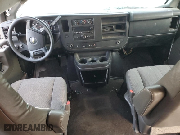 2014 Chevrolet Express Passenger LT with VIN 1GAZG1FGXE1187397, listed as a Copart auction lot 43209785 with 168,614 mi miles and Salvage title. Bid and sale history available at DreamBid. Image 8.