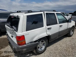 1998 Jeep Grand Cherokee Laredo with VIN 1J4GZ58S4WC244954, listed as a Copart auction lot 55731465 with 205,766 mi miles and Salvage title. Bid and sale history available at DreamBid. Image 3.