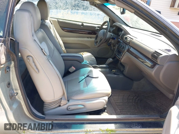 2004 Chrysler Sebring Limited z VIN 1C3EL65R74N171865, wystawiony jako IAAI lot #41996305 z przebiegiem 151 613 mil mil oraz . Historia ofert i sprzedaży dostępna na DreamBid. Obrazek 5.