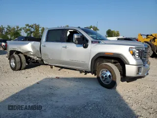 2022 GMC Sierra 3500HD Denali z VIN 1GT49WEY1NF311546, wystawiony jako Copart lot #69049904 z przebiegiem 32 844 mil mil oraz Szkody całkowita. Historia ofert i sprzedaży dostępna na DreamBid. Obrazek 4.