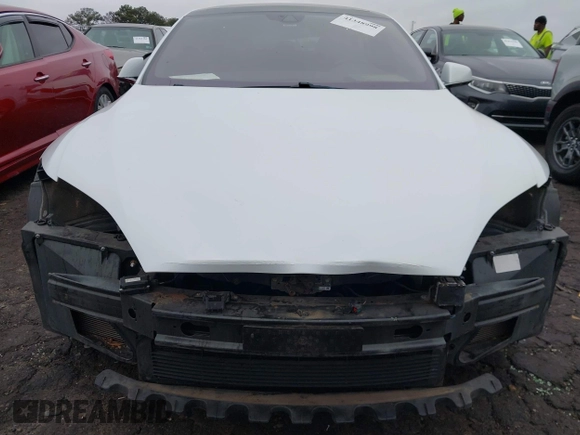2016 Tesla Model S 90D with VIN 5YJSA1E26GF155962, listed as a IAAI auction lot 41348998 with 134,269 mi miles and . Bid and sale history available at DreamBid. Image 12.