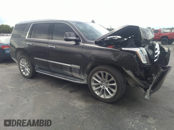 2018 Cadillac Escalade Luxury z VIN 1GYS3BKJ7JR204609, wystawiony jako IAAI lot #40951011 z przebiegiem 79 335 mil mil oraz . Historia ofert i sprzedaży dostępna na DreamBid. Obrazek 1.