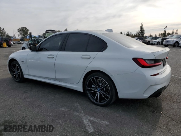 2022 BMW 3 Series 330e with VIN 3MW5P7J00N8C57811, listed as a Copart auction lot 42154045 with 29,705 mi miles and Salvage Title. Bid and sale history available at carsss.com. Image 2.