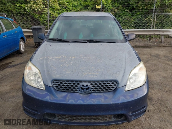 2003 Toyota Matrix Std with VIN 2T1KR32EX3C012210, listed as a IAAI auction lot 42152686 with 299,999 mi miles. Bid and sale history available at carsss.com. Image 6.