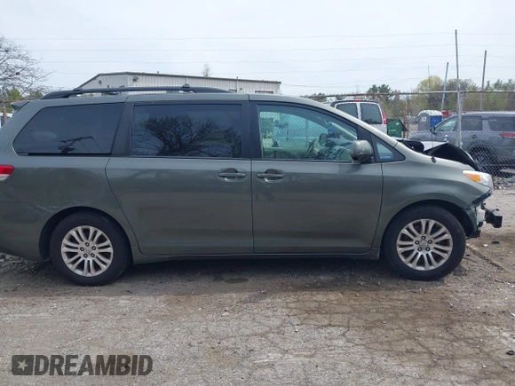2012 Toyota Sienna XLE AAS with VIN 5TDYK3DC1CS199113, listed as a IAAI auction lot 42123757 with 211,723 mi miles and . Bid and sale history available at carsss.com. Image 13.
