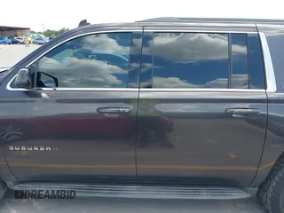 2015 Chevrolet Suburban LT z VIN 1GNSKJKC9FR245097, wystawiony jako IAAI lot #42468168 z przebiegiem 198 454 mil mil oraz . Historia ofert i sprzedaży dostępna na DreamBid. Obrazek 14.