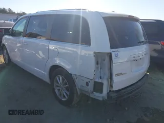 2019 Dodge Grand Caravan SXT with VIN 2C4RDGCG8KR761462, listed as a IAAI auction lot 41322097 with 132,110 mi miles. Bid and sale history available at carsss.com. Image 3.