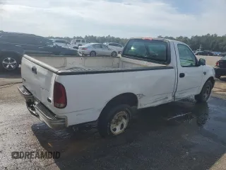 2003 Ford F-150 XL with VIN 1FTRF17W33NA54471, listed as a Copart auction lot 42594765 with 134,409 mi miles and Salvage Title. Bid and sale history available at DreamBid. Image 3.