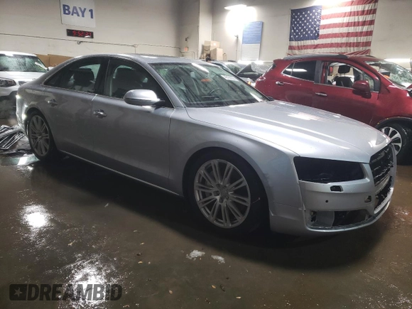 2015 Audi A8 with VIN WAUJGAFD1FN011100, listed as a Copart auction lot 49166055 with 38,575 mi miles and Salvage title. Bid and sale history available at DreamBid. Image 4.