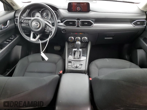 2019 Mazda CX-5 Sport with VIN JM3KFABM5K1597891, listed as a Copart auction lot 55020815 with 100,454 mi miles and Non Repairable. Bid and sale history available at DreamBid. Image 8.