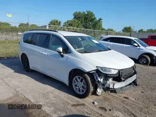 2022 Chrysler Pacifica Touring L with VIN 2C4RC1BGXNR233654, listed as a IAAI auction lot 42137632 with 73,899 mi miles and . Bid and sale history available at DreamBid. Image 1.