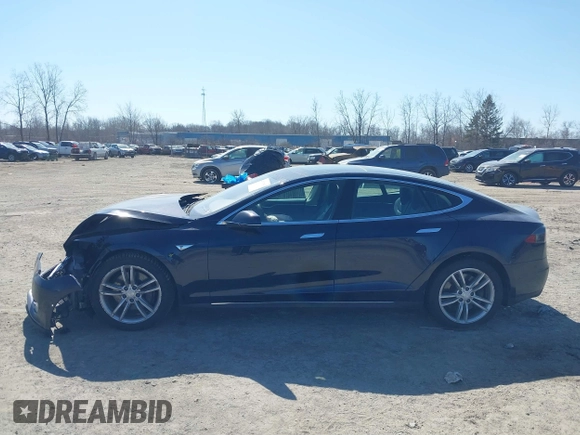 2015 Tesla Model S 85D with VIN 5YJSA1H25FFP70562, listed as a IAAI auction lot 41787957 with 177,688 mi miles. Bid and sale history available at carsss.com. Image 14.