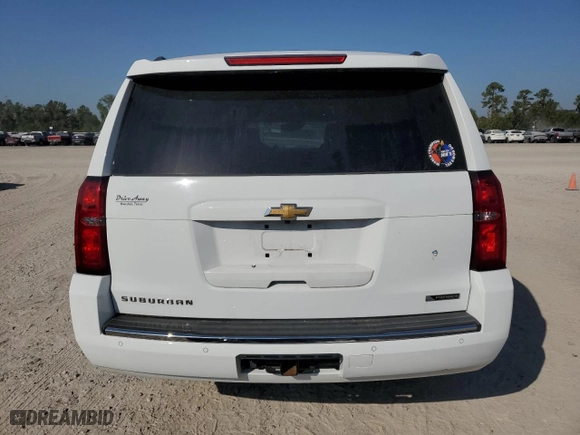 2017 Chevrolet Suburban Premier with VIN 1GNSCJKC7HR128988, listed as a Copart auction lot 73958784 with 121,662 mi miles and Salvage Title. Bid and sale history available at carsss.com. Image 6.
