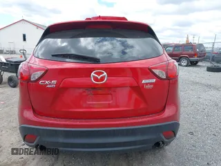2015 Mazda CX-5 Touring with VIN JM3KE4CY7F0492559, listed as a IAAI auction lot 42053447 with 95,675 mi miles. Bid and sale history available at carsss.com. Image 16.