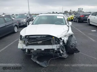 2015 Ford Fusion Titanium Hybrid with VIN 3FA6P0RU3FR247118, listed as a IAAI auction lot 41210219 with 143,348 mi miles. Bid and sale history available at carsss.com. Image 12.