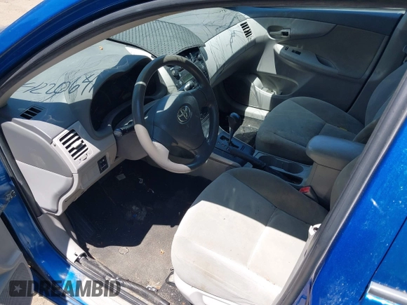 2009 Toyota Corolla with VIN 2T1BU40E69C167904, listed as a IAAI auction lot 42206415 with 201,694 mi miles. Bid and sale history available at carsss.com. Image 5.