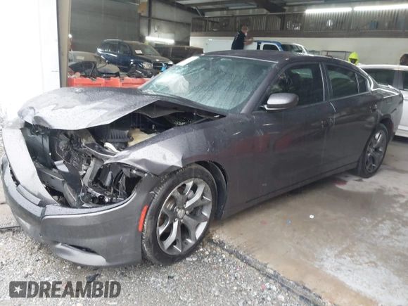 2015 Dodge Charger SXT with VIN 2C3CDXHG8FH848115, listed as a IAAI auction lot 41912162 with 171,229 mi miles and . Bid and sale history available at DreamBid. Image 2.